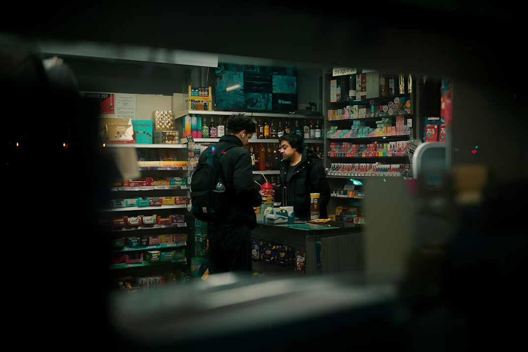 detective confronting shoplifter